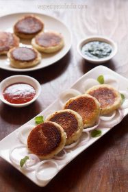 paneer patties on a white platter.