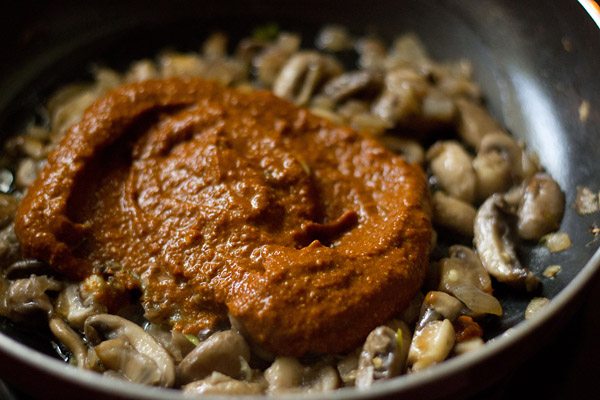 prepared vindaloo masala paste added to mushrooms. 