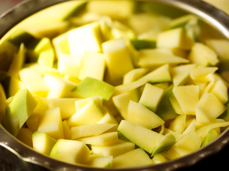 chopped mangoes in a large mixing bowl