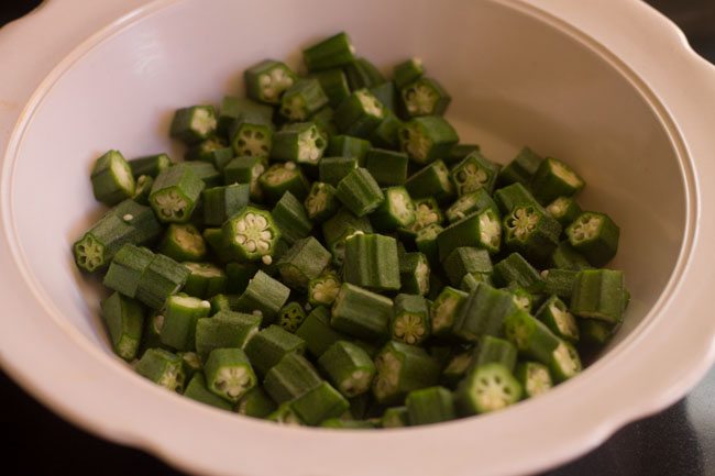 okra sliced into roundels in a bowl. 