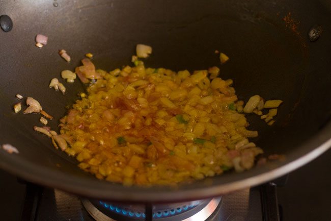 turmeric powder mixed well with onions. 