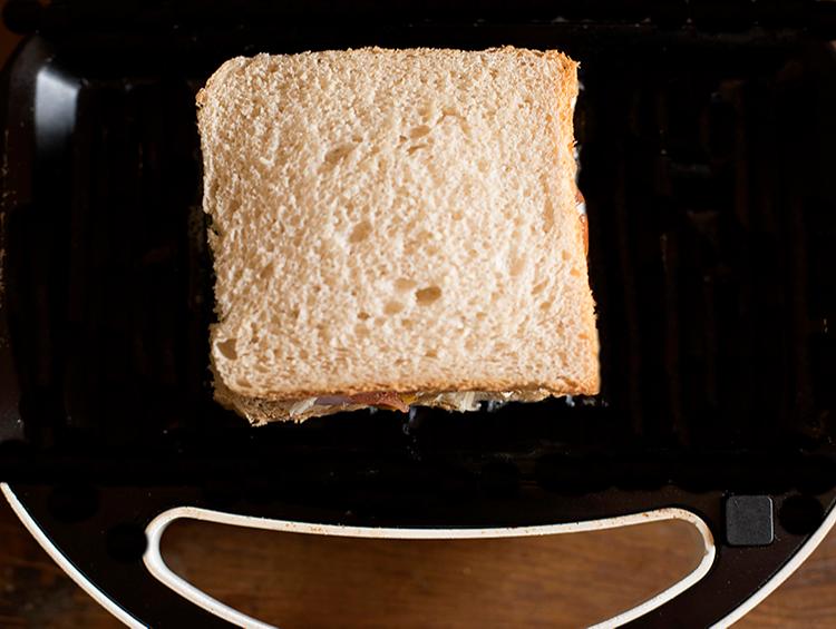 chana sandwich placed on a toaster. 