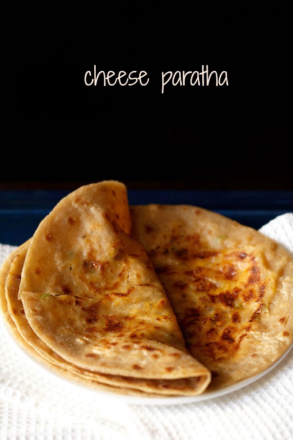 cheese paratha served on a plate with text layover.
