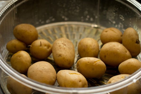 parboiled baby potatoes for tandoori aloo recipe. 