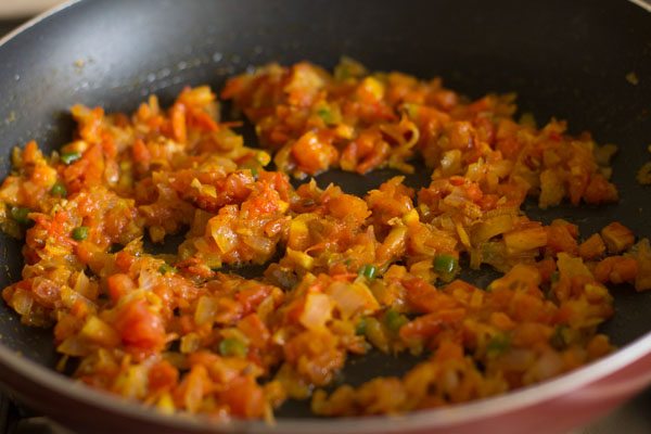spices mixed in the onion-tomato mixture. 
