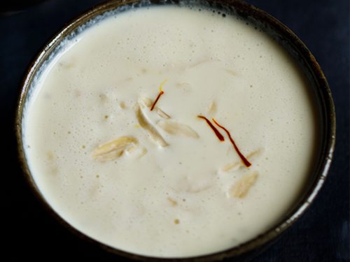 badam kheer in a bowl.