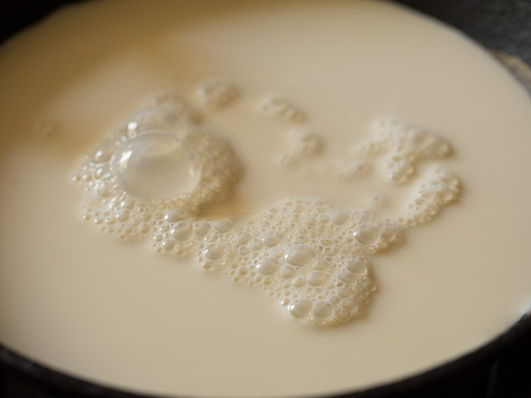 milk added in a heavy pan. 