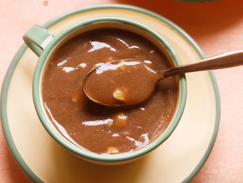 ragi malt served in a bowl with a spoon