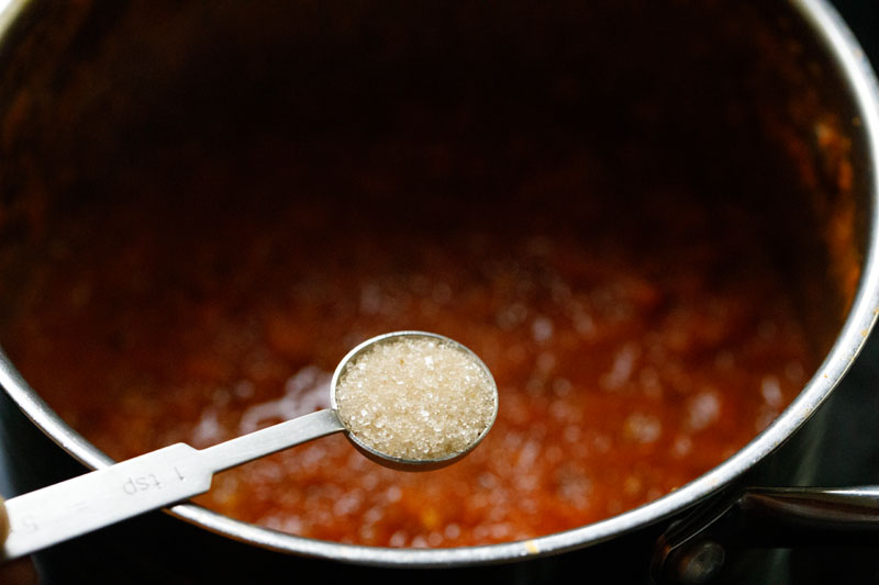 sugar added to marinara in skillet off the heat to balance the acidity