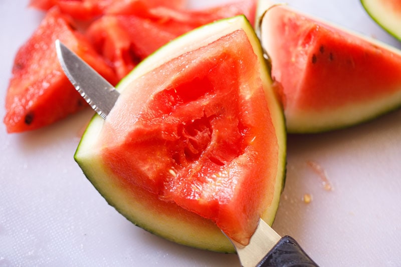 separating watermelon flesh from the rind