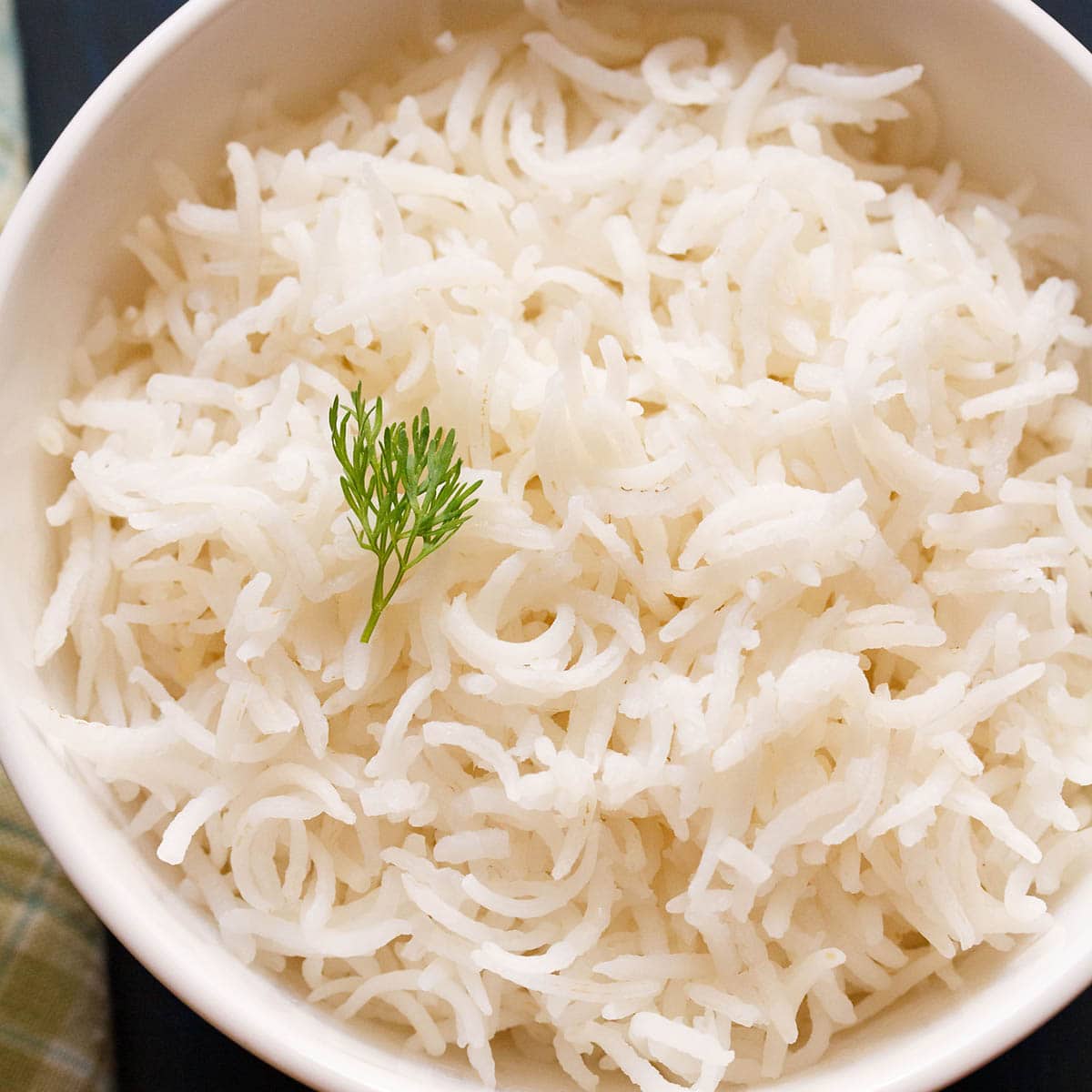 Calories in 1.5 cup(s) of White Rice - Cooked Avg.