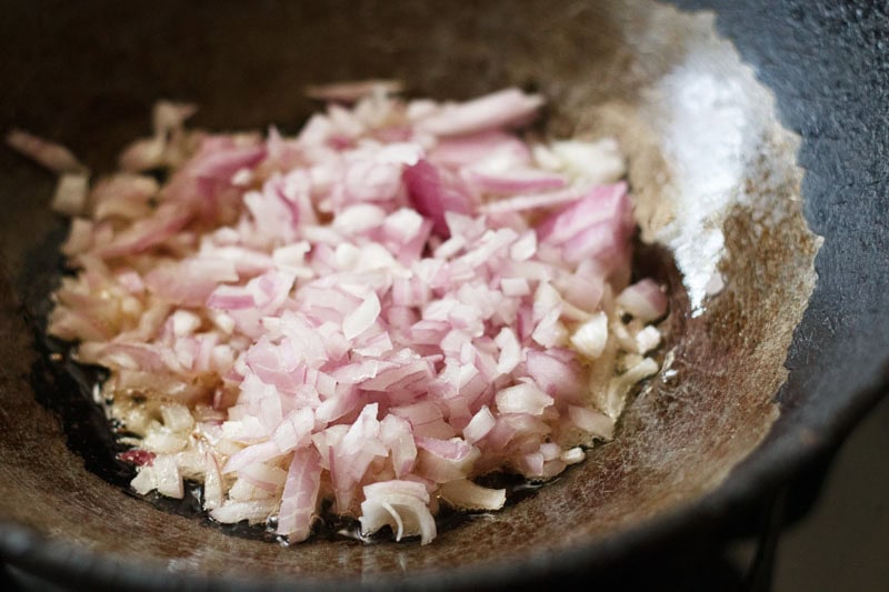 onion added to wok.