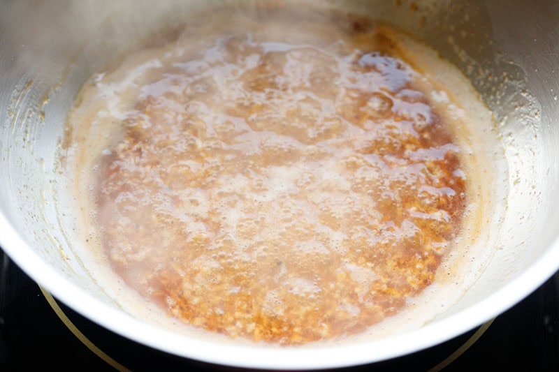 pasta water added and being cooked.