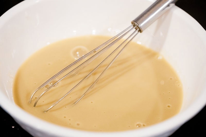 vinegar being mixed with a whisk. 