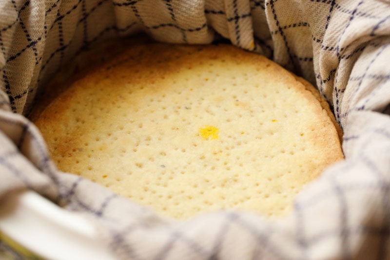 baked sheermal placed inside a moist kitchen towel.