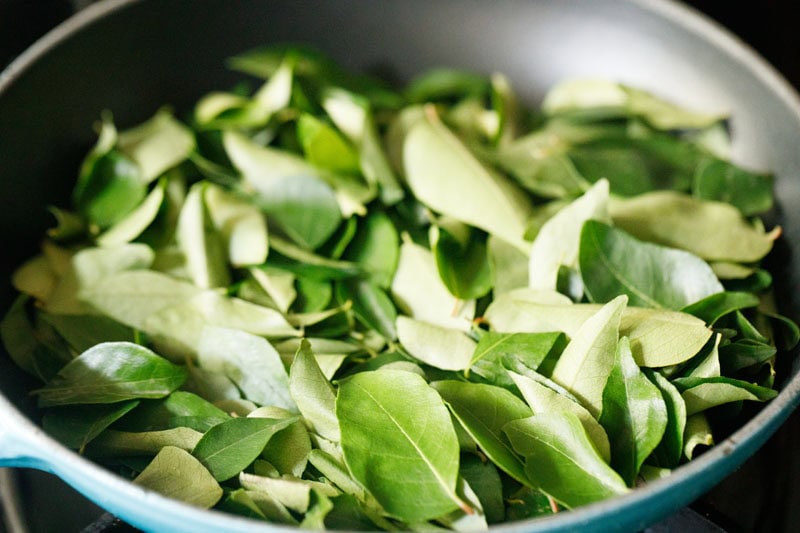 curry leaves in skillet.