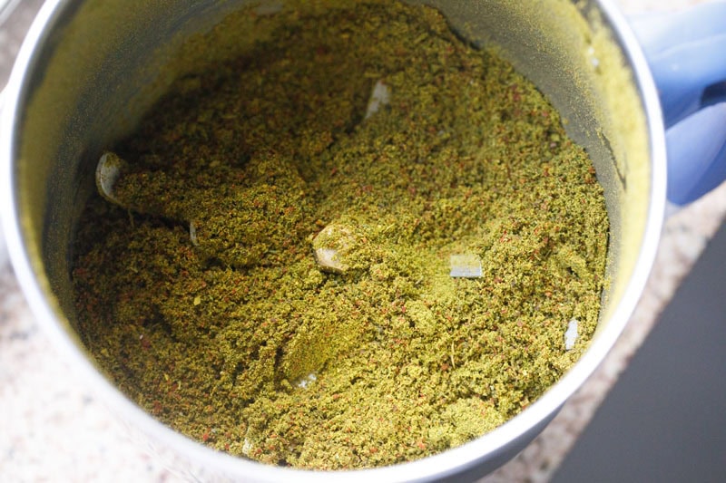 ground karuveppilai podi  in the blender jar.