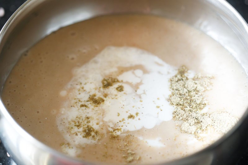 thick coconut milk, cardamom powder on top of pureed tender coconut mixture.