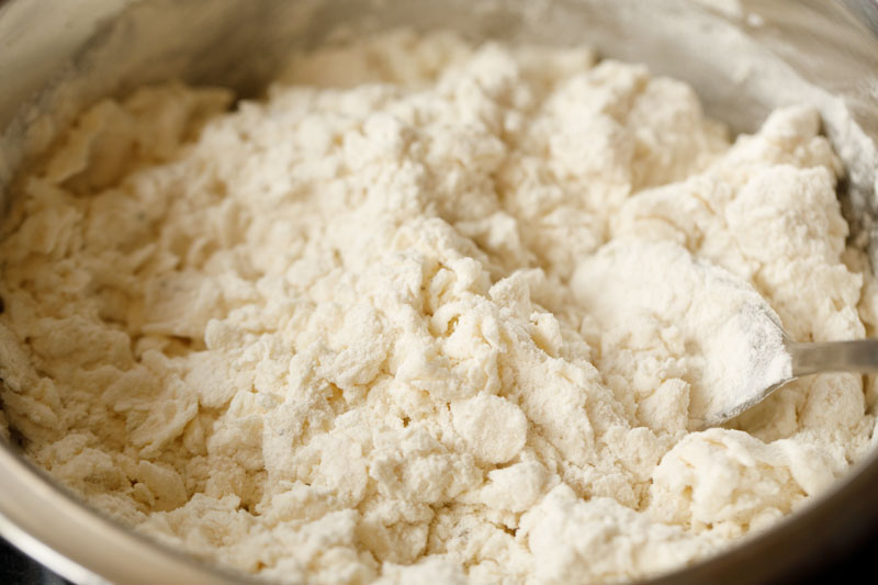 mixed flour and milk in pan.