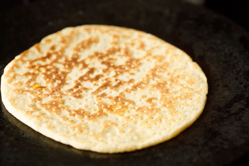 sheermal bread roasted with golden spots on it.