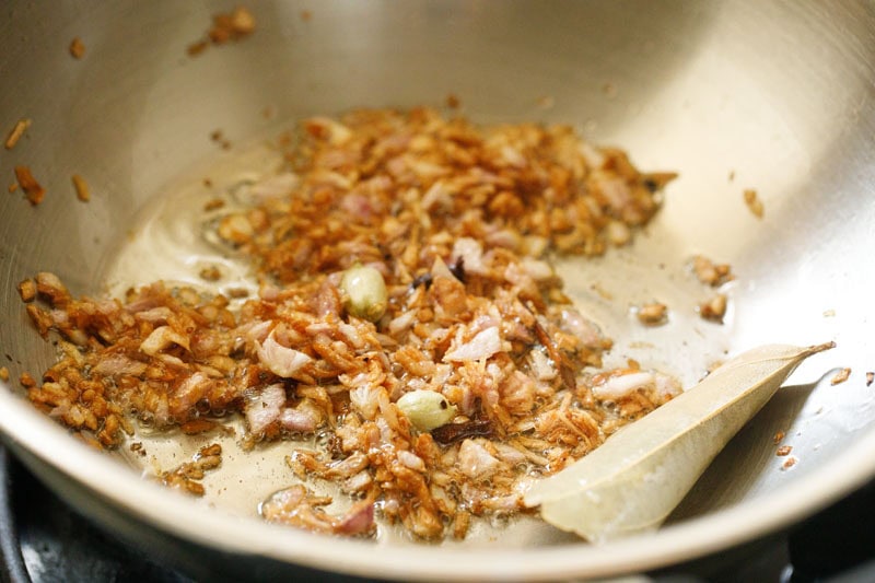 caramelized or golden brown onions in the pan.