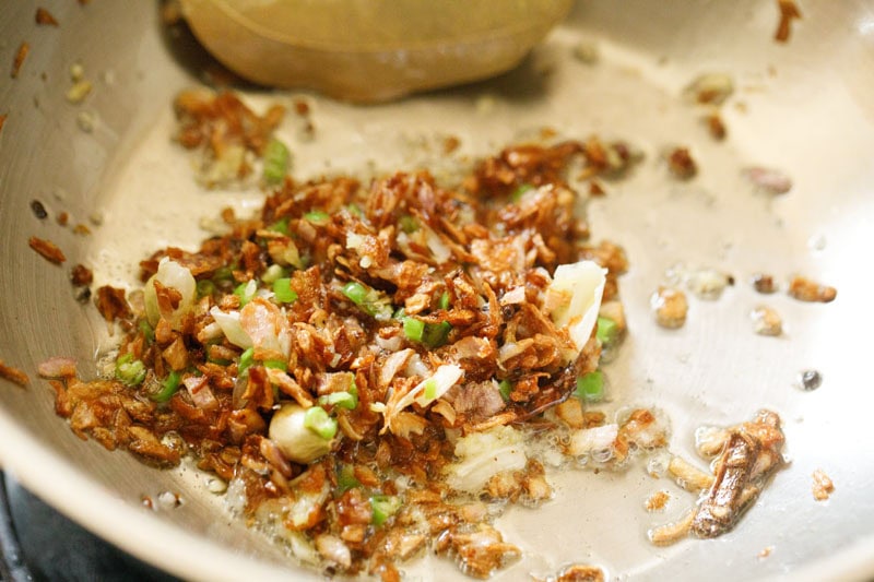 ginger-garlic paste and green chillies mixed with the golden brown onions.