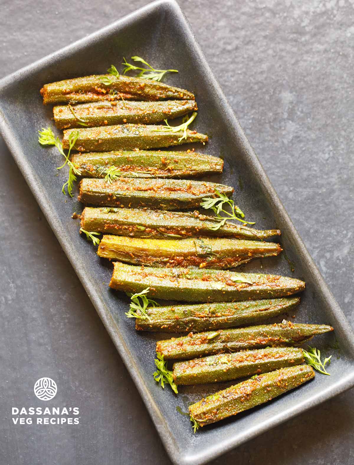 stuffed okra or stuffed bhindi served in a rectangle platter.