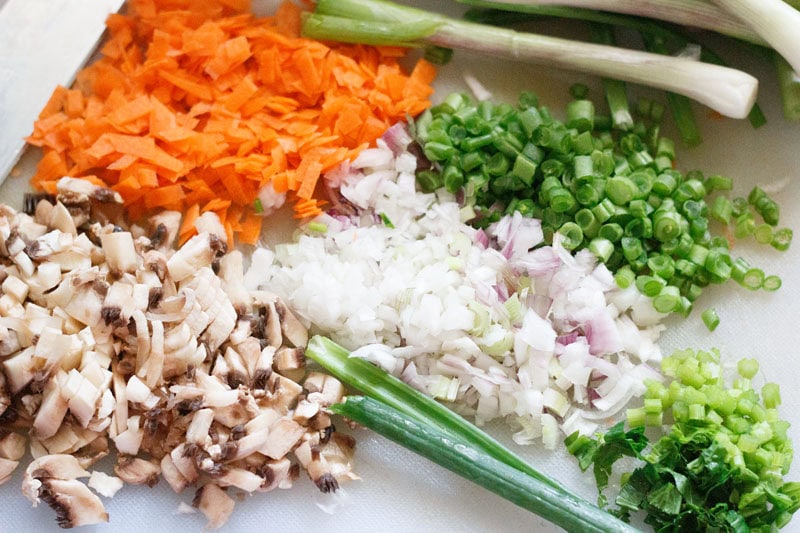 chopped mixed vegetables on a chopping board. 