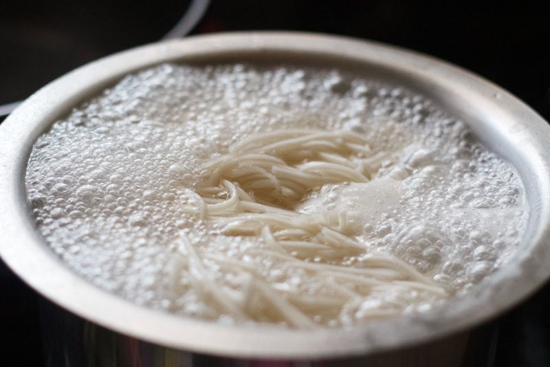 boiling hakka noodles. 