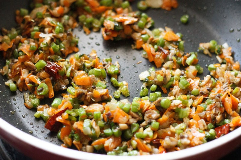 stir frying vegetables.